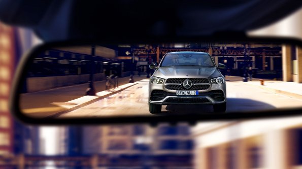 Mercedes‑Benz A‑Class: safety The image shows the A-Class driving in an urban environment.