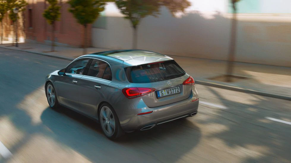 Mercedes‑Benz A‑Class: safety The image shows the A-Class driving in an urban environment.