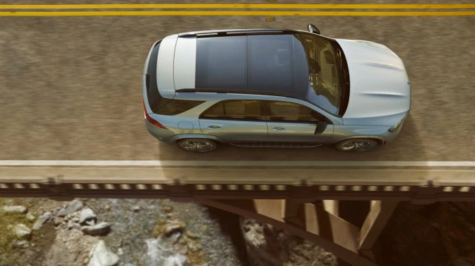 The image shows the A-Class driving in an urban environment.